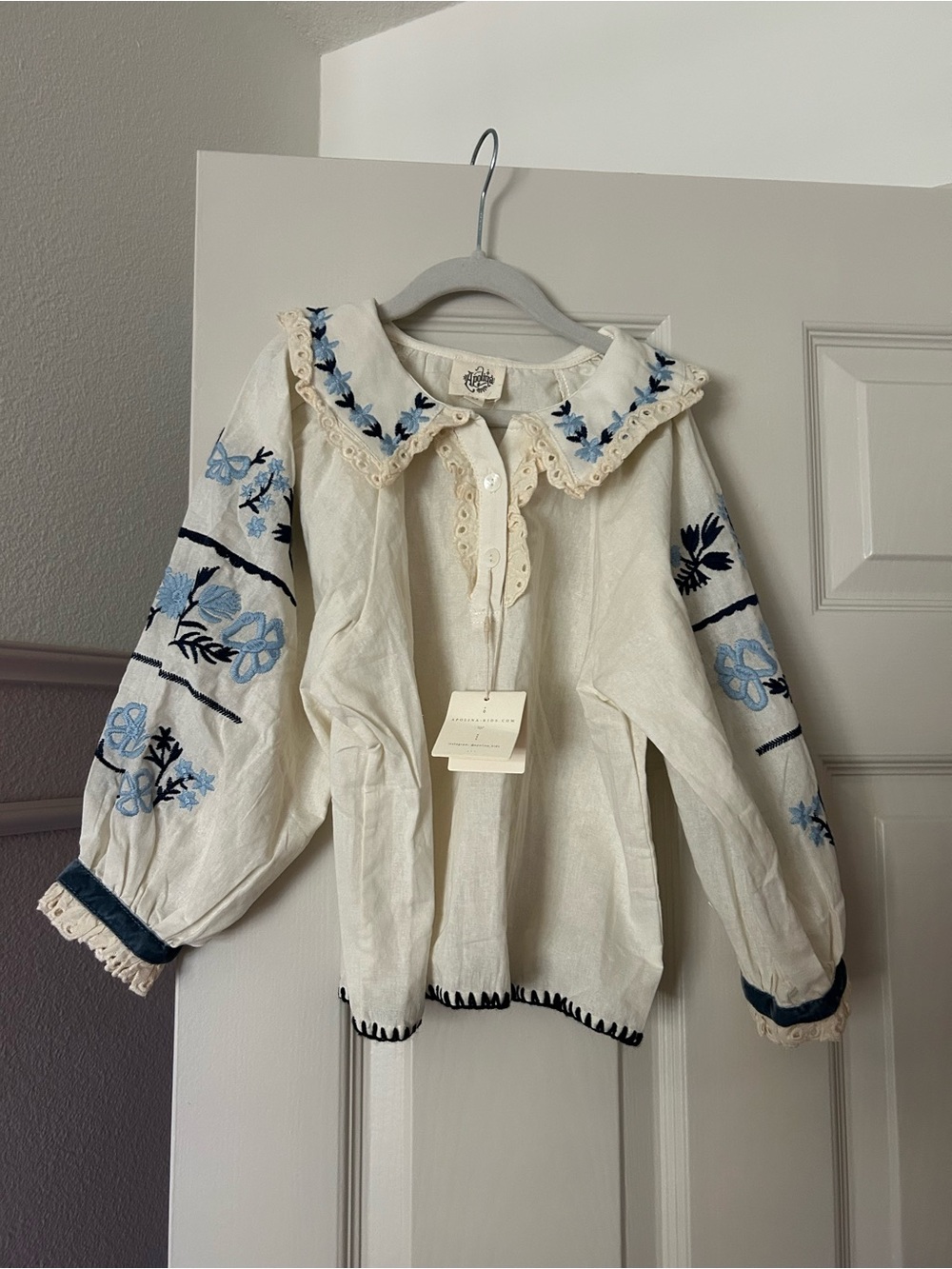 Apolina Malena Ivory Peasant Blouse with Blue Floral Embroidery